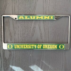 UNIVERSITY OF OREGON ALUMNI CHROME-FINISH METAL LICENSE PLATE FRAME, DUCK SHOP